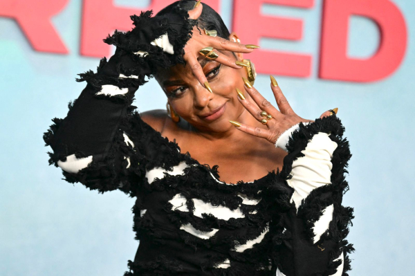 Taraji P. Henson showing off gold nails